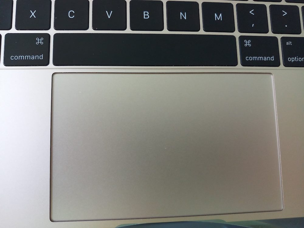 A close up photo showing Mac's Trackpad